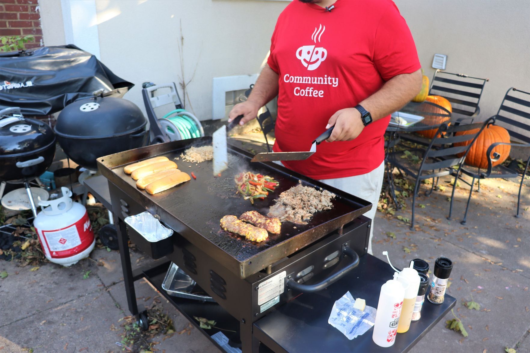 Blake Sykora preparing a Wisconsin cheese steak
